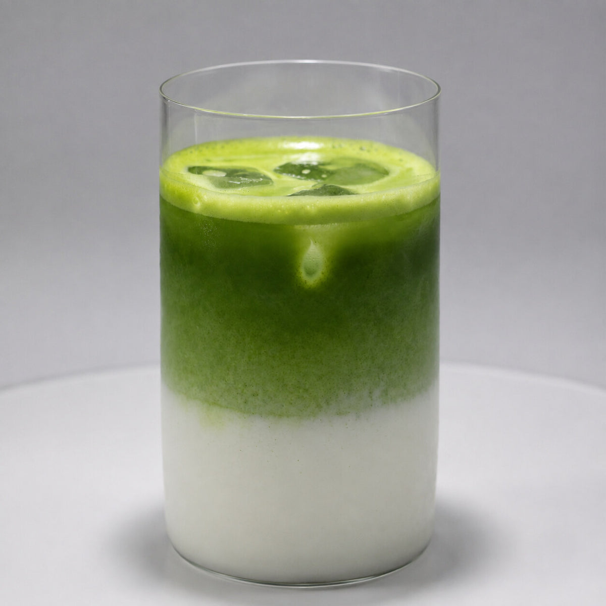 Iced Okumidori matcha latte in a clear glass